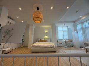 Ένα ή περισσότερα κρεβάτια σε δωμάτιο στο 禾光 illuminate