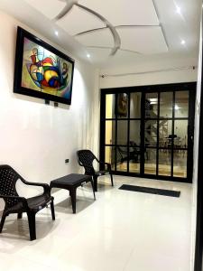 Μια τηλεόραση ή/και κέντρο ψυχαγωγίας στο Toquipal Suites