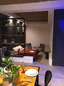 a living room with a couch and a table at Lomas del Mirador 3 in San Fernando del Valle de Catamarca