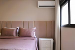 Ένα ή περισσότερα κρεβάτια σε δωμάτιο στο 3 Luxury Suites + Sophistication +26 φωτογραφίες