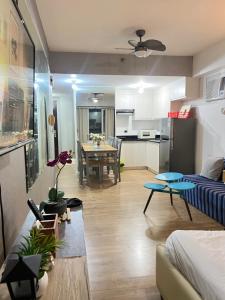 Kuchyň nebo kuchyňský kout v ubytování Abreeza Place Alveo + 10 fotografií