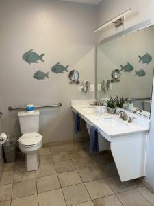 Koupelna v ubytování Sandy Toes Studio + 4 fotografie