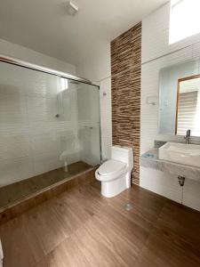 a bathroom with a toilet and a sink at Golden Suite Miraflores 