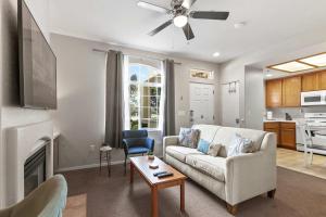 a living room with a couch and a fireplace at Eye Sea in Oceano +10 photos