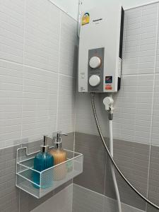 Koupelna v ubytování Molly Home มอลลี่โฮม + 14 fotografií