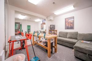 a living room with a couch and a table at Mt Spokane ski condo in Mead