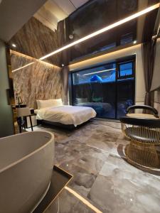 Postel nebo postele na pokoji v ubytování 델루나호텔