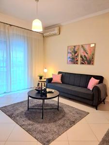 Χώρος καθιστικού στο Cozy City Center Apartment