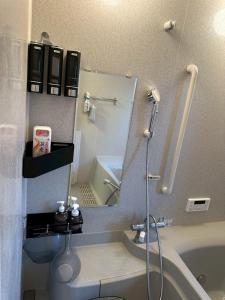 Koupelna v ubytování 海まで徒歩2分大切なペットと自由な旅を