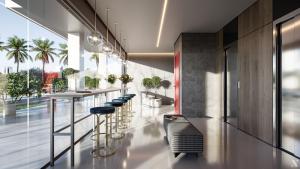 a bar in a hotel lobby with stools at Alugueasy - EASY Noroeste in Brasília