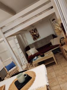 Posezení v ubytování Appartement romantique avec jacuzzi