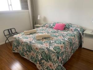 Ένα ή περισσότερα κρεβάτια σε δωμάτιο στο Allawah at Wamberal