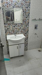 Koupelna v ubytování Mitron Homes + 3 fotografie