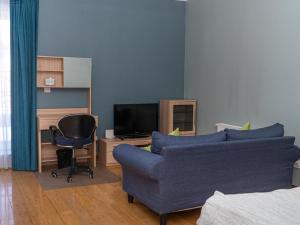 TV a/nebo společenská místnost v ubytování Tanan Center Serviced Apartments