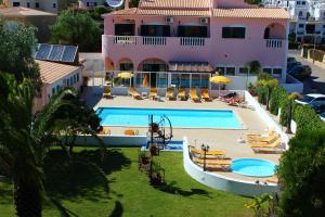 an aerial view of a resort with a swimming pool at Solar de Mos in Lagos