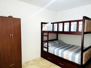 Postel nebo postele na pokoji v ubytování Casa Guadalupana - Manta + 31 fotografií