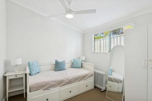 Ένα ή περισσότερα κρεβάτια σε δωμάτιο στο Cozy Sunset Villa 2BR Hamptons 200MBs Wifi