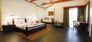 Postel nebo postele na pokoji v ubytování Pura Vida Cabilao Resort