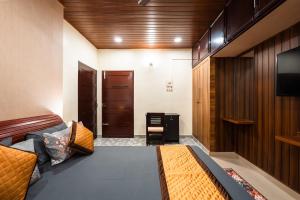 TV a/nebo společenská místnost v ubytování Jyothi - Bright and Cozy