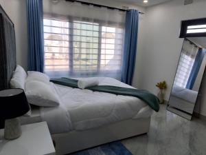 Afbeelding uit fotogalerij van T&M apartments in Ndola