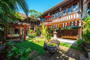 Κήπος έξω από το Pao Come Boutique House