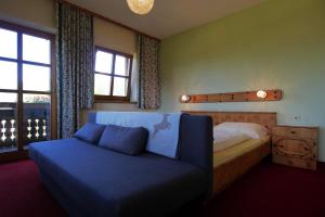 Ένα ή περισσότερα κρεβάτια σε δωμάτιο στο Pension Patz