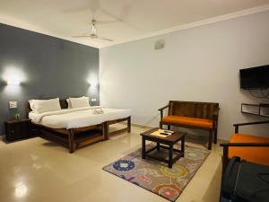 TV a/nebo společenská místnost v ubytování Golden Pearl Beach Resort + 42 fotografií