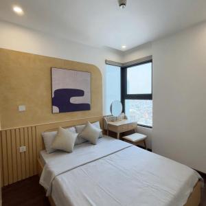 Ένα ή περισσότερα κρεβάτια σε δωμάτιο στο Hoang Huy Commerce Tower Apartment & Homestay +264 φωτογραφίες