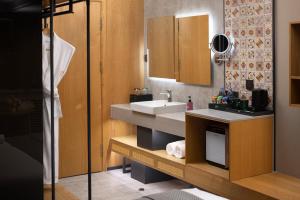 Η κουζίνα ή μικρή κουζίνα στο 秋果酒店西安钟楼北大街地铁站店 +18 φωτογραφίες