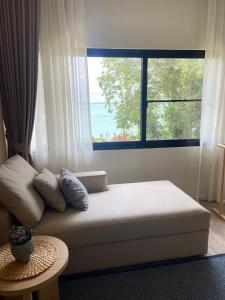 Ένα ή περισσότερα κρεβάτια σε δωμάτιο στο B101 3BR 4BA Peaceful Hillside Sea View Home +20 φωτογραφίες