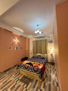 Ένα ή περισσότερα κρεβάτια σε δωμάτιο στο Citycomfort Homestay