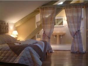 Letto o letti in una camera di Manoir des Chanterelles
