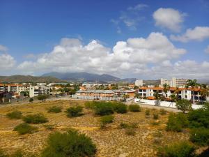 a view of a city with buildings and trees at Apartamento Costa Azul Oasis frente CC La Vela in Porlamar