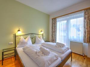 Ένα ή περισσότερα κρεβάτια σε δωμάτιο στο Comfortable Vicky Apartment in Wildschönau, cleaning included