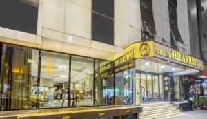 a store front of a building with glass windows at Grand Hilarium Hotel in Istanbul