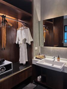 Koupelna v ubytování NAI YA Hotel -SHA Extra Plus