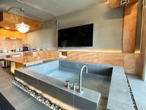 Kuchyň nebo kuchyňský kout v ubytování Gyeongju Mauna Ocean Resort