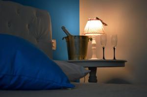 Postel nebo postele na pokoji v ubytování B&B Harmonia