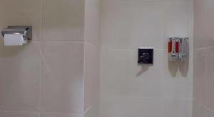 Koupelna v ubytování Tropical Point Hotel Syariah