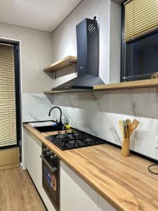 Afbeelding uit fotogalerij van Riverside Cotagge in Poti +49 foto's