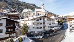 an aerial view of a town in the snow at LAUDEGGHOF Ladis in Ladis