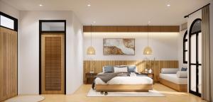 a bedroom with a bed and a couch at The Motifs Eco Hotel - SHA Extra Plus in Chanthaburi