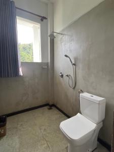 Ένα μπάνιο στο Winland Coffee & Stay +31 φωτογραφίες