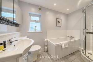 a white bathroom with a tub and a sink at Fit for a King-size Nap I Parking in Windsor