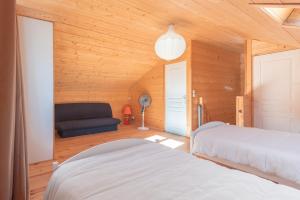 Postel nebo postele na pokoji v ubytování Cottage En Bois 6 Pers - Laruns