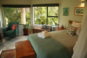 Ένα ή περισσότερα κρεβάτια σε δωμάτιο στο The Sauna Chalet