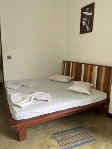 Ένα ή περισσότερα κρεβάτια σε δωμάτιο στο Winland Coffee & Stay