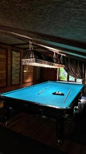 Biliár nebo kulečník v ubytování Гостевой дом