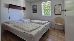 Ένα ή περισσότερα κρεβάτια σε δωμάτιο στο North Bornholm, Sea View, Sandy Beach And Rocks