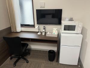 Kuchyň nebo kuchyňský kout v ubytování 未来ホテル MiraiHotel + 3 fotografie